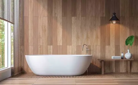 Wood-slat decorative plywood wall panelling in a bathroom interior