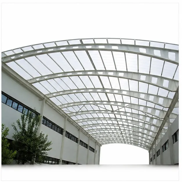Translucent corrugated FRP roofing sheets fitted over an industrial building frame