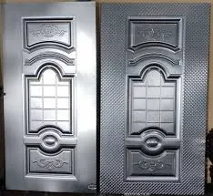 Pair of metallic-finish moulded FRP door skin panels with raised panel and embossed design