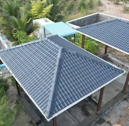 Grey corrugated FRP roofing sheets installed over an outdoor pergola structure