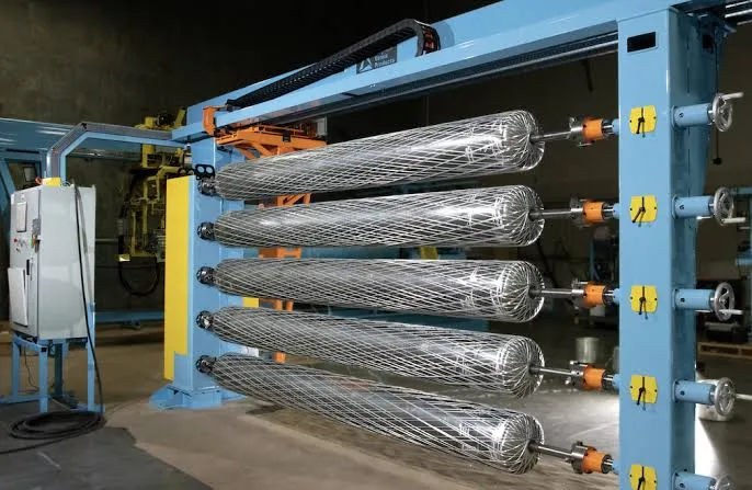 Multi-spindle filament winding machine with fibre-wound mandrels loaded on the rack